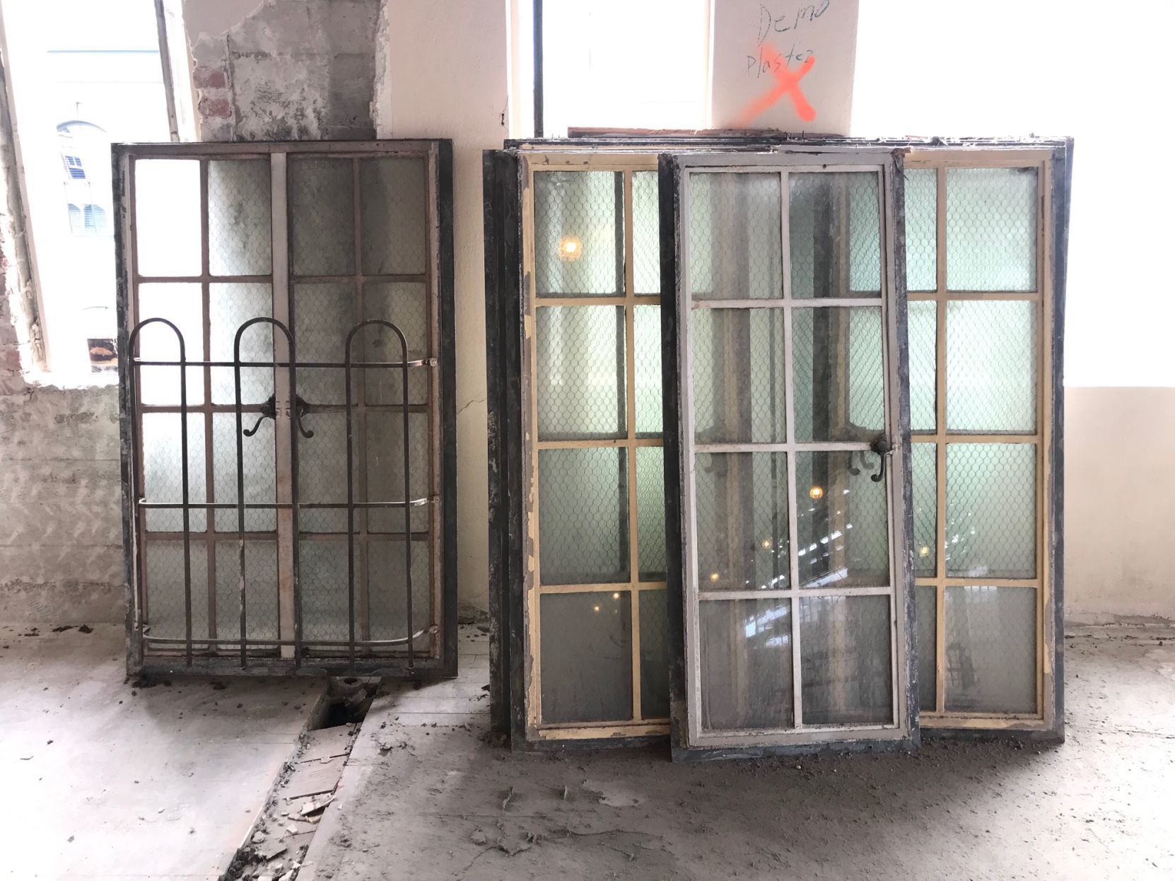 Metal framed windows salvaged from the Gordon Building renovation